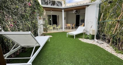 Villa tropicale avec piscine partagée et à 2 minutes de la plage