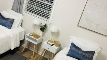 3 bedrooms, desk, blackout drapes, iron/ironing board