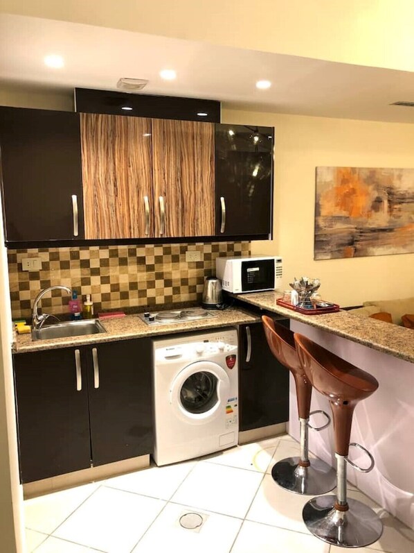 Fridge, microwave, stovetop, electric kettle