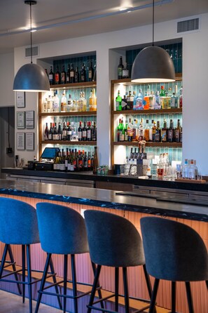 3 bars/lounges, poolside bar