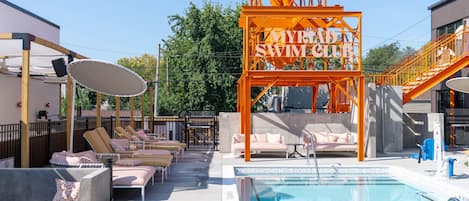 Outdoor pool, free pool cabanas, pool umbrellas