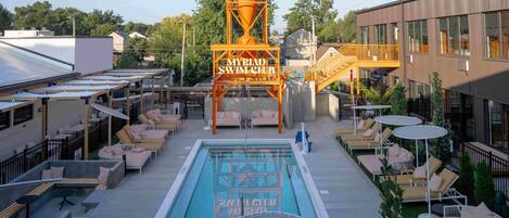 Outdoor pool, open 9:00 AM to 10:00 PM, free pool cabanas