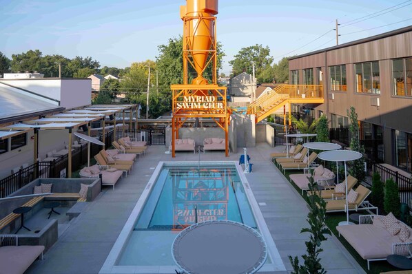 Outdoor pool, open 9:00 AM to 10:00 PM, free pool cabanas