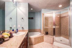 Combined shower/bathtub, hair dryer, towels, soap
