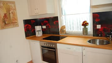 Microwave, stovetop, dishwasher, coffee/tea maker