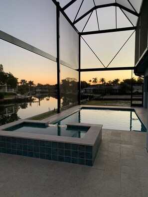 Outdoor pool, a heated pool - Entire 4 Bedroom W/Pool Access (Marco Island)