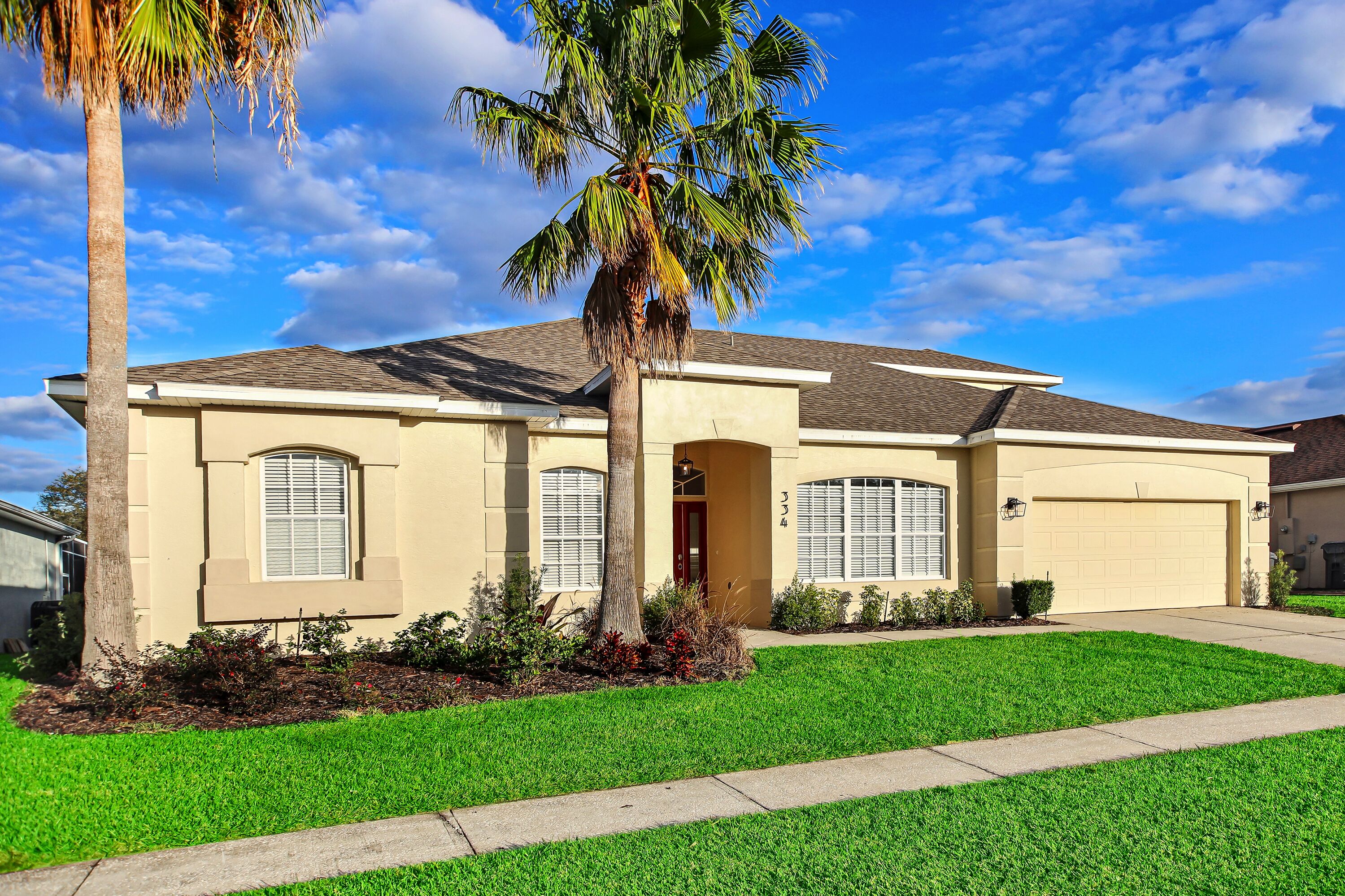 Amazing 6 bedroom home with pool on greens of golf course!