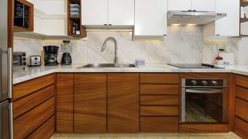 Fridge, microwave, stovetop, coffee/tea maker