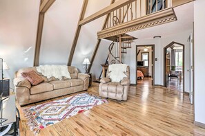 TV, fireplace, books