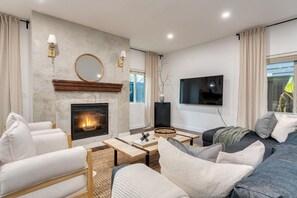 Smart TV, fireplace, books