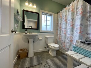 Hair dryer, towels, soap, shampoo