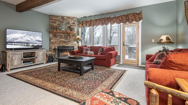 Townhome, Fireplace, Mountain View | Living area | 40-inch TV with digital channels, fireplace - Villages of the Wisp 25 Liftside (McHenry)