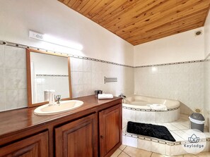 Bathtub, hair dryer, towels