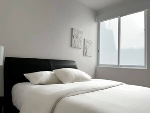 1 bedroom, desk, iron/ironing board, travel cot