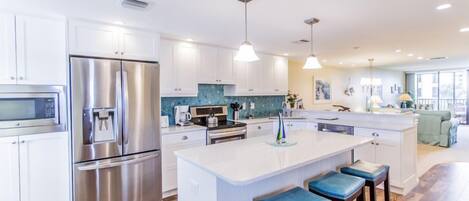 Fridge, coffee/tea maker, cookware/dishes/utensils