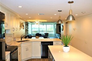 Fridge, coffee/tea maker, cookware/dishes/utensils