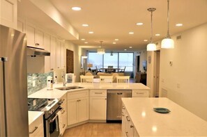 Fridge, coffee/tea maker, cookware/dishes/utensils