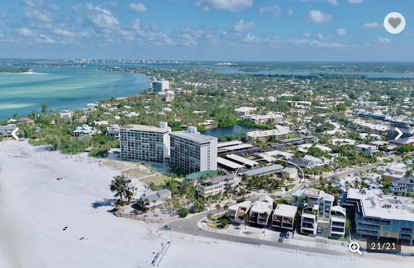Stunning beachfront property offers direct beach access and panoramic coastal views in this vibrant waterfront community. - Gulf Holiday Unit 11- Updated close to the beach and village! (Siesta Key)