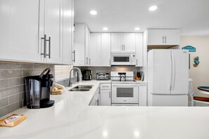 Fridge, dishwasher, coffee/tea maker, toaster