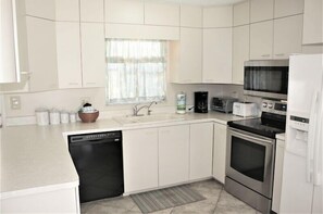 Fridge, dishwasher, coffee/tea maker, toaster