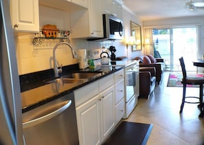 Fridge, dishwasher, coffee/tea maker, toaster - Jamaica Royale 009 Updated and across from pool! (Siesta Key)