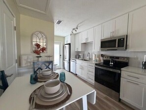 Fridge, dishwasher, coffee/tea maker, toaster