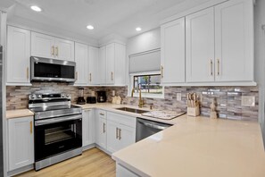 Fridge, dishwasher, coffee/tea maker, toaster