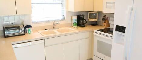 Fridge, dishwasher, coffee/tea maker, toaster