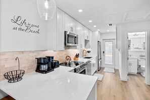 Fridge, oven, stovetop, coffee/tea maker