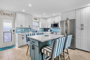 Fridge, dishwasher, coffee/tea maker, toaster