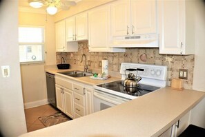 Fridge, dishwasher, coffee/tea maker, toaster