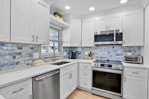 Fridge, dishwasher, coffee/tea maker, toaster