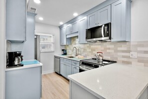 Fridge, dishwasher, coffee/tea maker, toaster