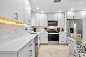 Fridge, dishwasher, coffee/tea maker, toaster