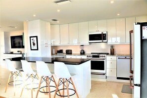 Fridge, microwave, oven, stovetop - Jamaica Royale 201: Family-Friendly Beachfront Condo with Stunning Gulf Views! (Siesta Key)