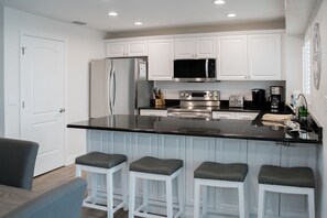 Fridge, microwave, oven, stovetop - Book Your Coastal Escape at Jamaica Royale 405: Beachfront Condo with Balcony (Siesta Key)