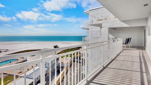 A balcony with a view of the beach and ocean. - Family Beach Getaway at Jamaica Royale 705 in Siesta Key! (Siesta Key)