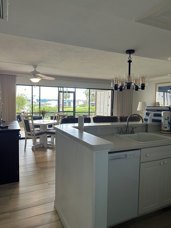 Fridge, microwave, oven, stovetop - Midnight Cove II 211F - Bayfront Views and Modern Touches (Siesta Key)