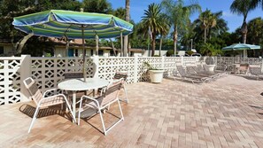Outdoor dining - Siesta Beach House #210 Updated Unit Steps from the Beach (Siesta Key)