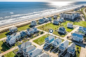 Exterior - Three-story, beach home with decks & partial Gulf view (Galveston)