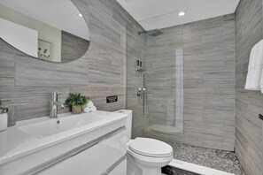 Shower, hair dryer, towels, soap