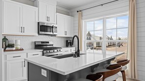 Fridge, microwave, oven, stovetop - Beach House-Orange Beach. Free parking and walking distance to many attractions! (Orange Beach)