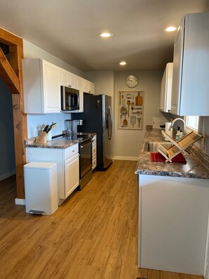 Fridge, microwave, oven, stovetop - Comfortable modern home near Ennis Lake (McAllister)