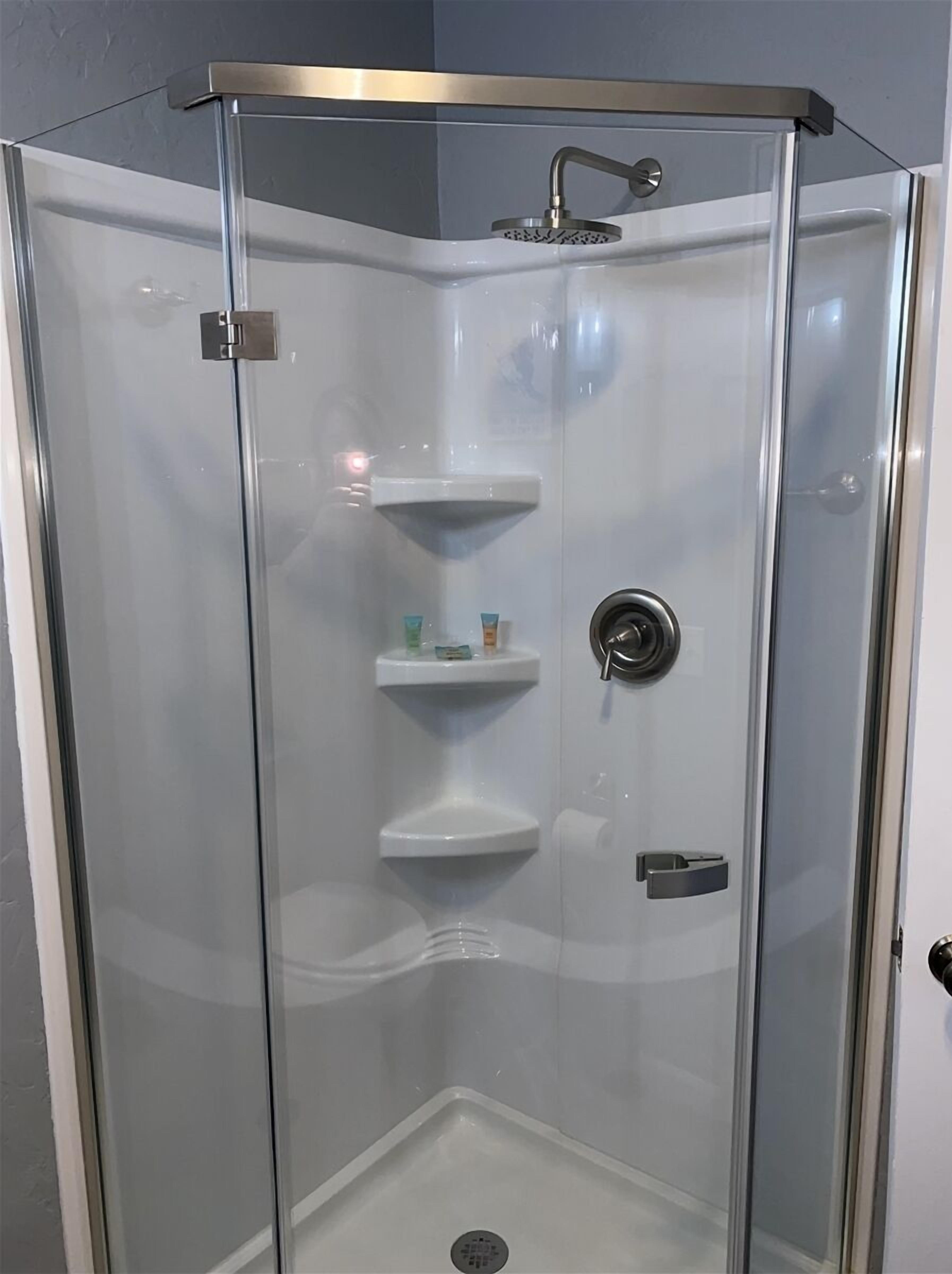 Bathtub, hair dryer, towels