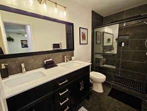 Shower, hair dryer, towels, soap