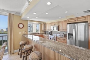 Coffee/tea maker, toaster, dining tables