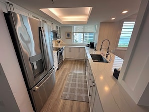 Coffee/tea maker, toaster, dining tables