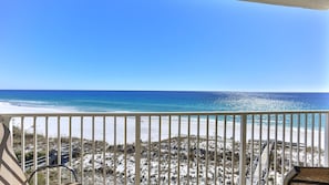 A balcony with a view of a beach and ocean. - Destin on the Gulf 606 (Destin)