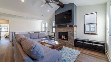 Smart TV, fireplace, foosball, table tennis