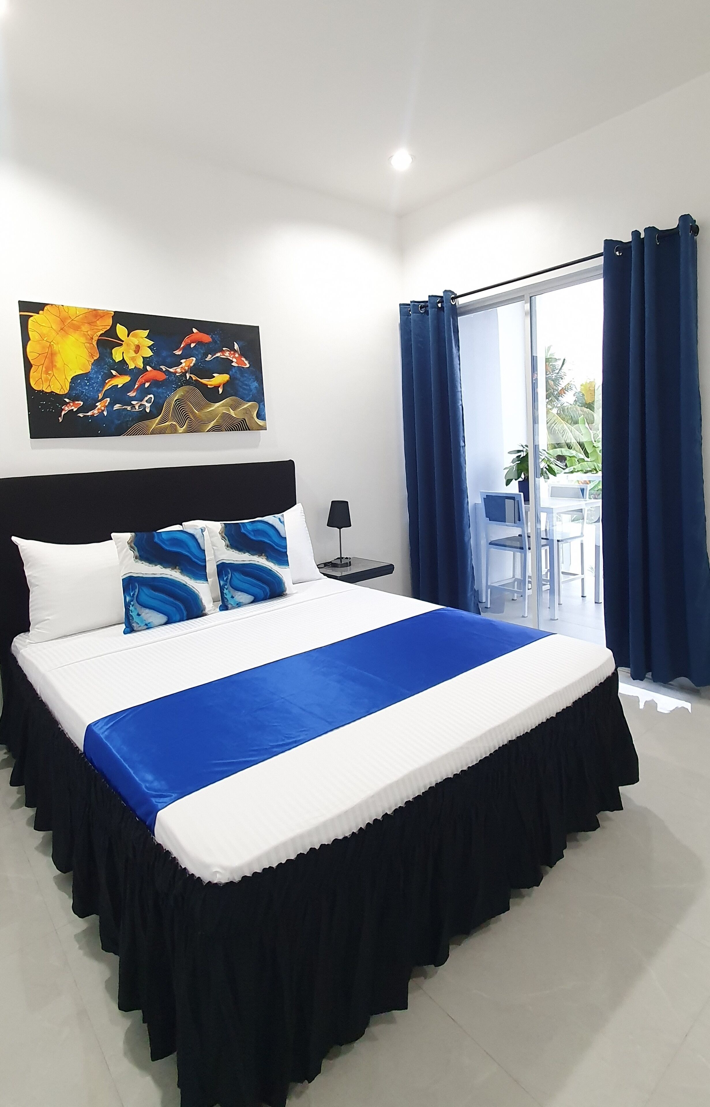 Habitación Deluxe, 1 cama de matrimonio, balcón, vistas a la piscina | Decoración individual, mobiliario individual, wifi gratis y ropa de cama